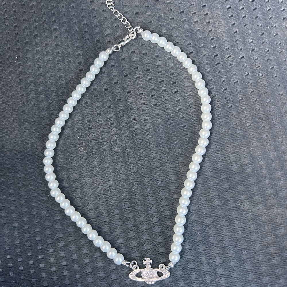 Saturn Pearl necklace